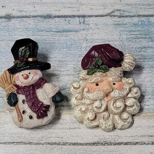 Festive Snowman and Santa Holiday Pin Set.